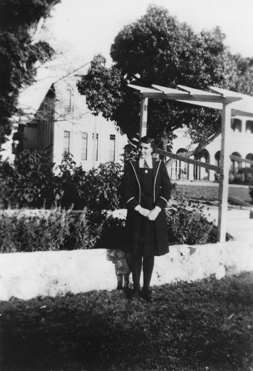 Ipswich Girls' Grammar schoolgirl, Dulcie Gardner, in front of the school, 1938