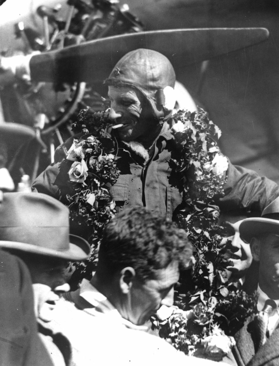 Relaxed portrait of Sir Charles Kingsford-Smith on arrival in Brisbane in 1928 after his record breaking flight