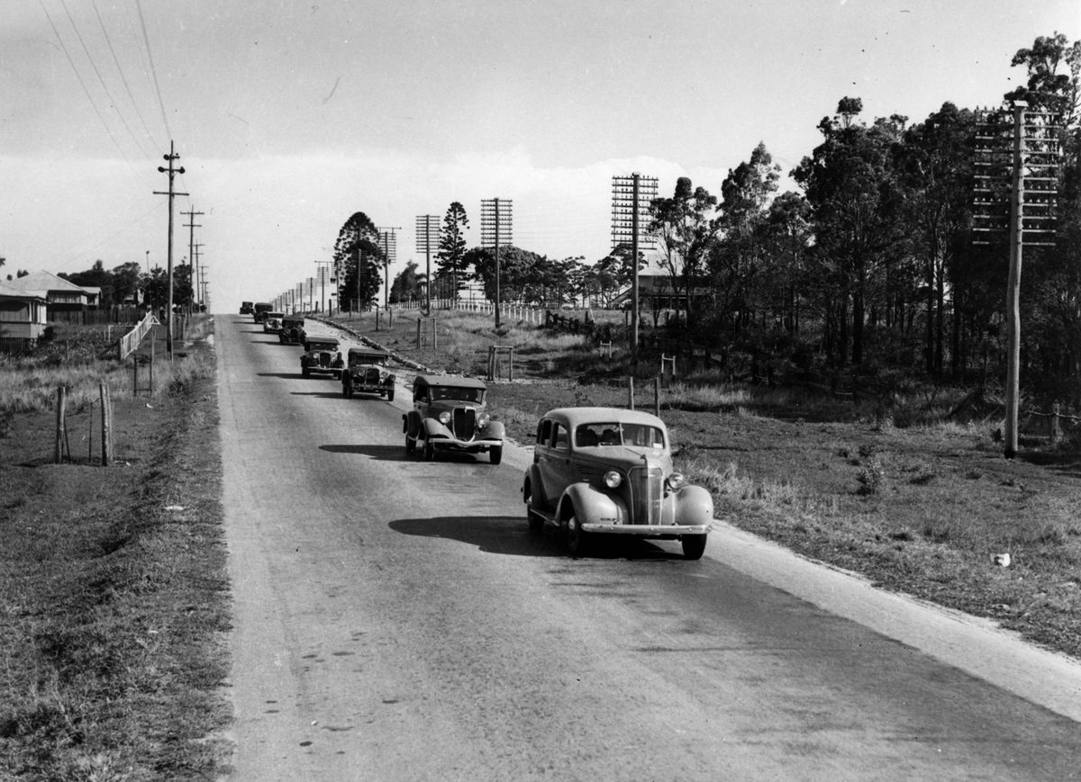 Traffic moving outbound along Sandgate Road at Boondall, Brisbane, 1938