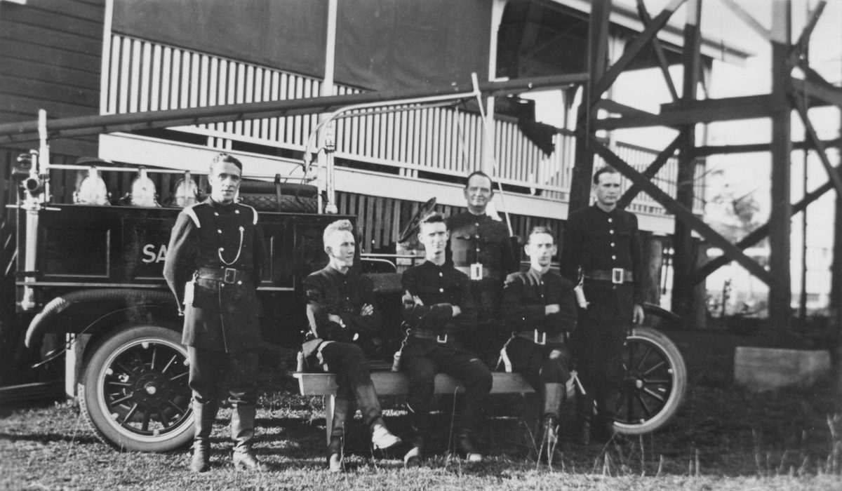 Members of the Sandgate Fire Brigade in front of a fire truck in Sandgate, 1923