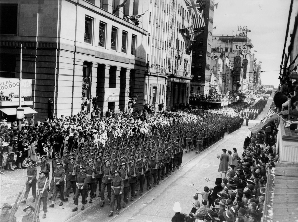 Returned World War Two soldiers march in Queen Street, Brisbane, 1944