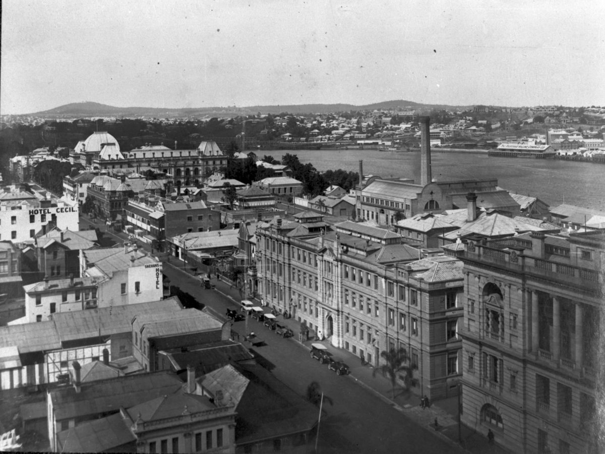 George Street looking past the Government Printing Office towards Parliament House with a view of the Brisbane River in the background