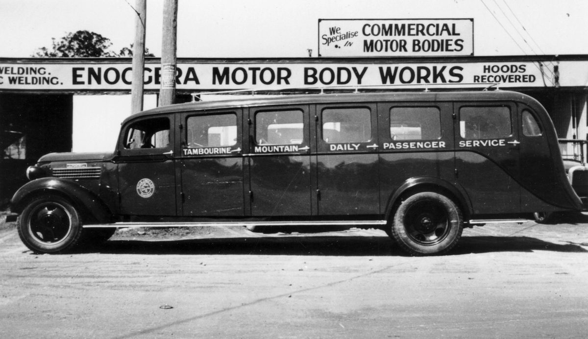 New Oldsmobile bus in front of the body work shop, 1937