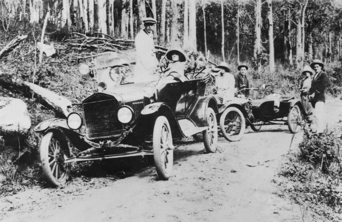 Car and motor cycle on the Mt Glorious Road, outside Brisbane, 1924