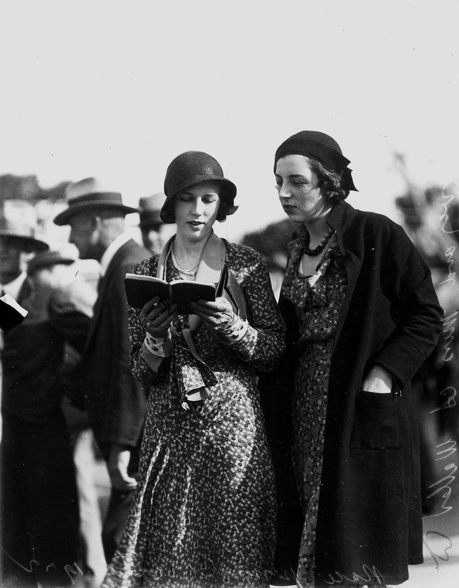 Mrs R. Harvey and Miss A. Waller picking a winner at Albion Park races, Brisbane, October 1932