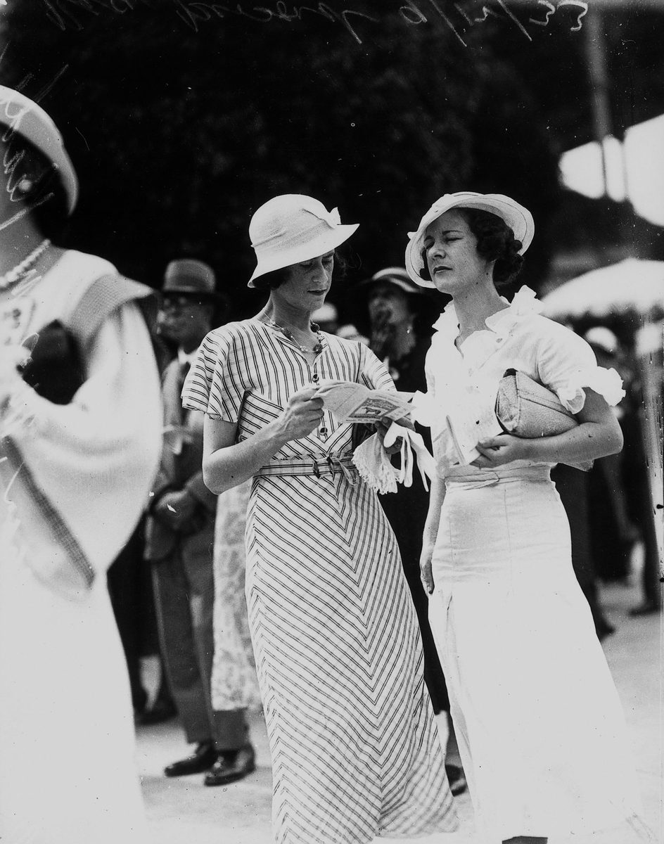 Miss P. Fegan and Miss W. Reade at Ascot races, Brisbane, 9 December 1933