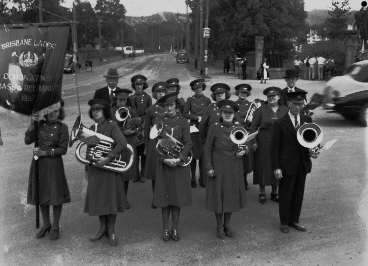 Brisbane Ladies' Coronation Brass and Reed Band outside the gates of Toowong Cemetery, 1940