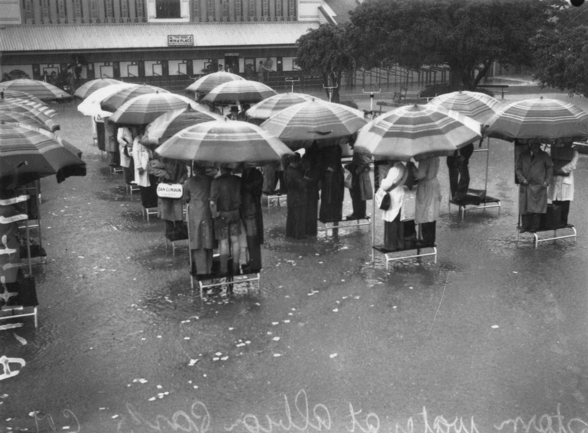 Bookmakers marooned in the ring at Albion Park, Brisbane, 1941