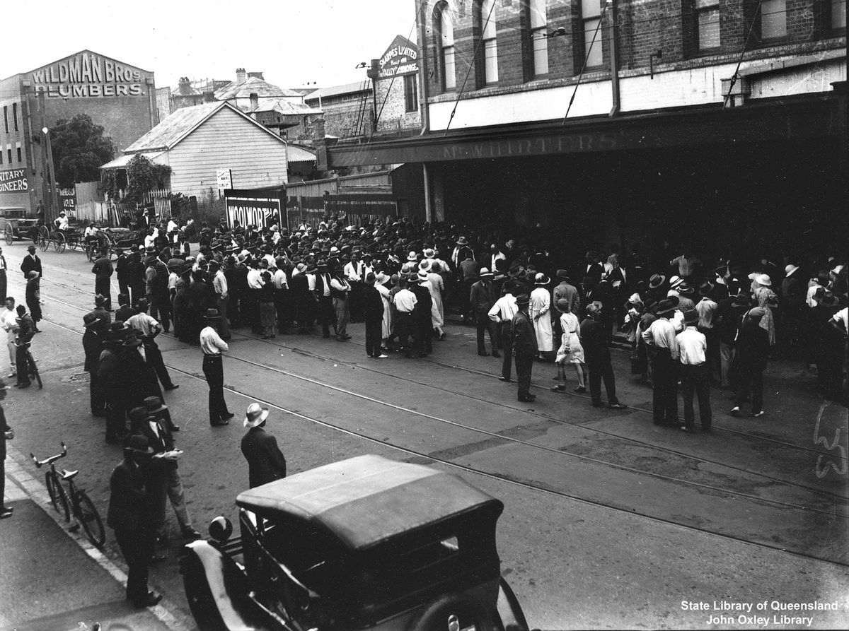Crowd gathered for free food outside the McWhirters' building, Fortitude Valley, Brisbane, on Christmas Day 1933
