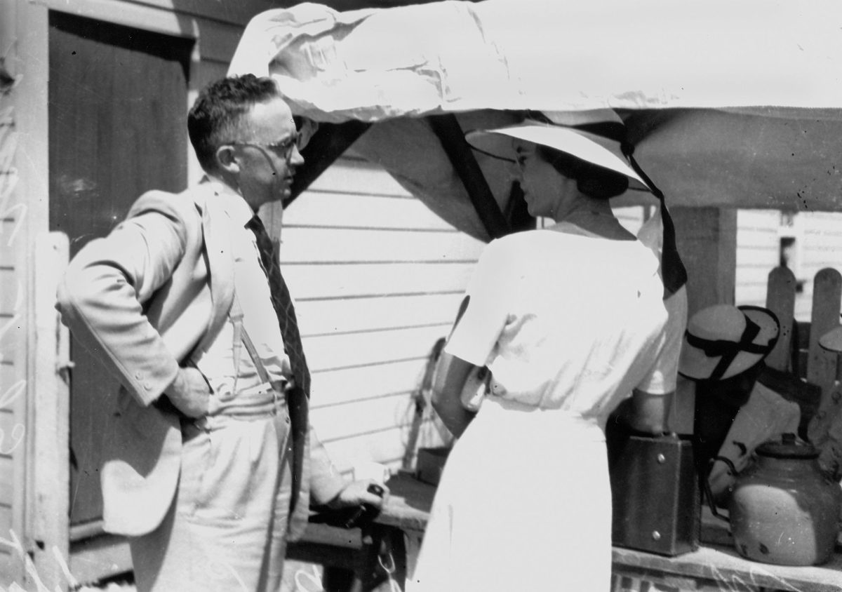 Mr K.J. Morris, the U.A.P. candidate for Ithaca, talks to a voter during the Queensland State Election of 1938
