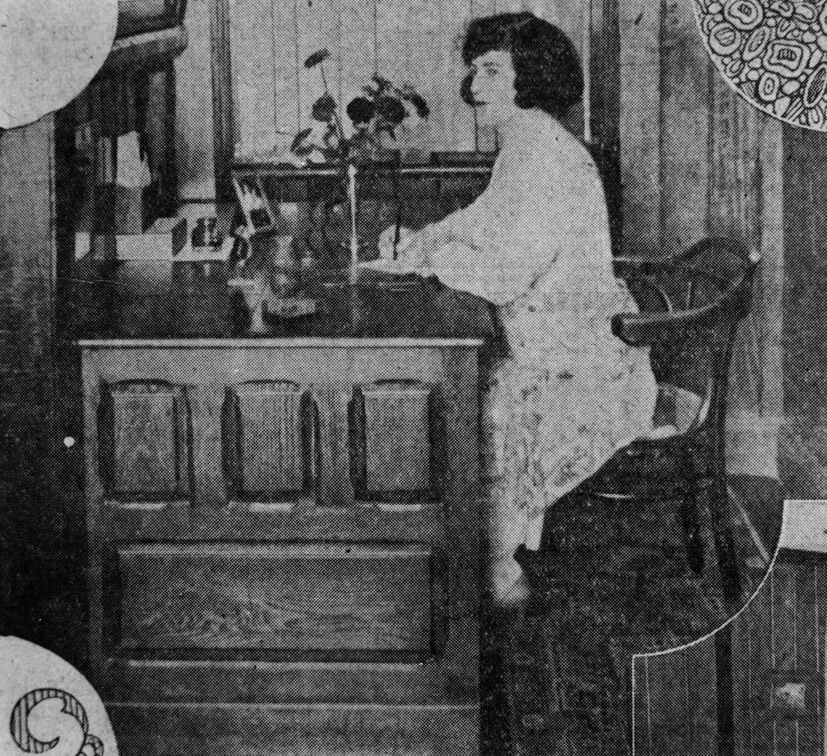 Phyllis Greene seated at her desk in the study of her home, Wynnum, 1930