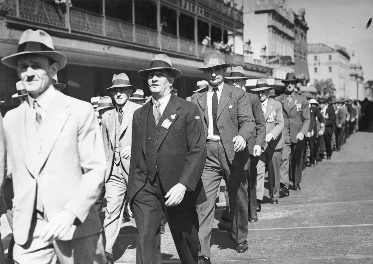 Anzac Day marchers passing People's Palace in Ann Street, Brisbane, 1937