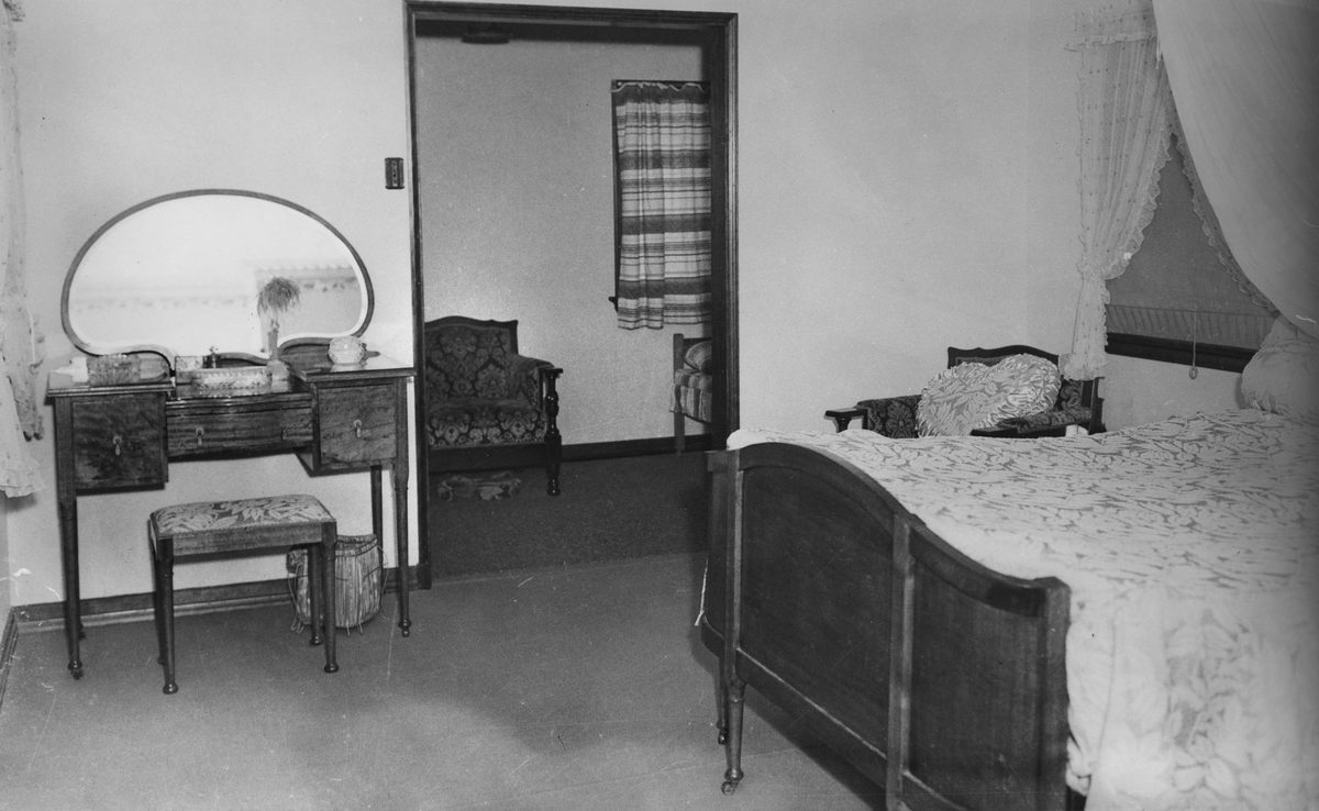 Main bedroom of Mr and Mrs E. Robinson's new home at Holland Park, 1940