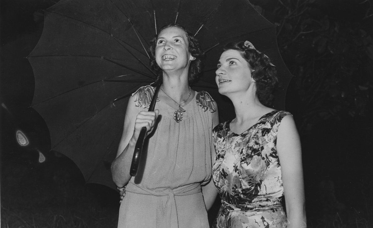 Two women take shelter when they arrived at All Saints Dance Hall, 1940