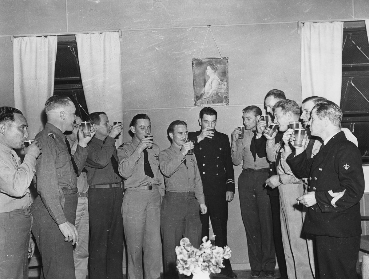 Dutch servicemen celebrating the birthday of Queen Wilhelmina at the Netherlands canteen, Brisbane, 1944