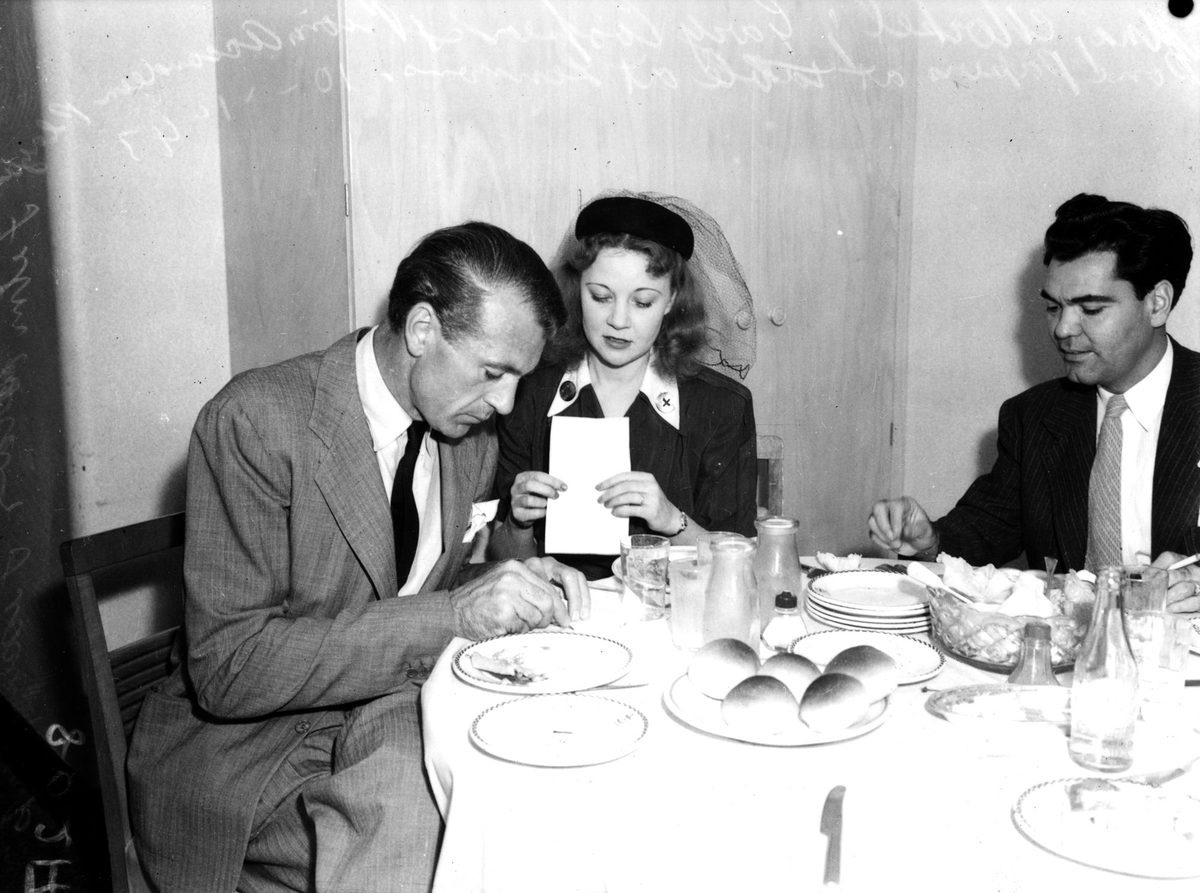 Film stars Gary Cooper and Una Merkel lunching in a private suite at Lennon's Hotel, Brisbane, 1943