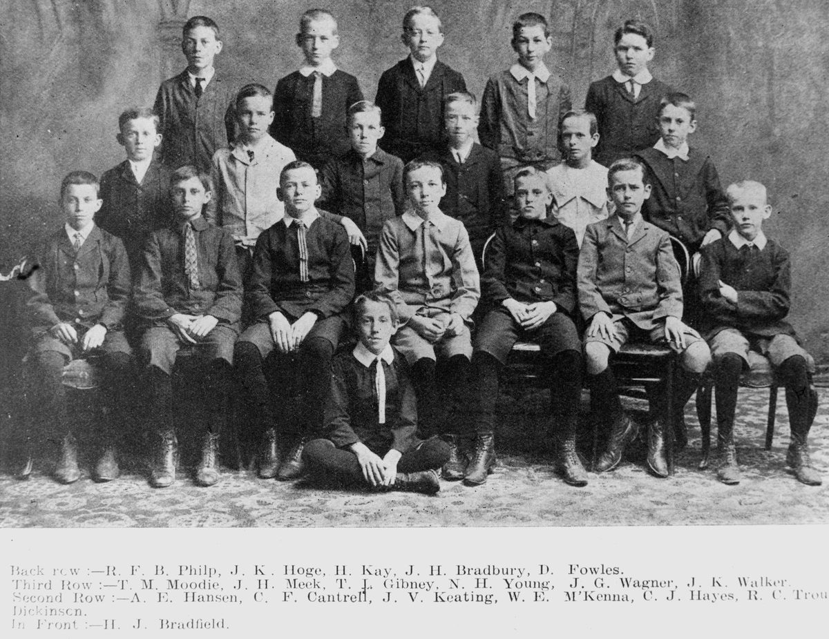 Group portrait of boys who have won scholarships to study in Brisbane, in 1909