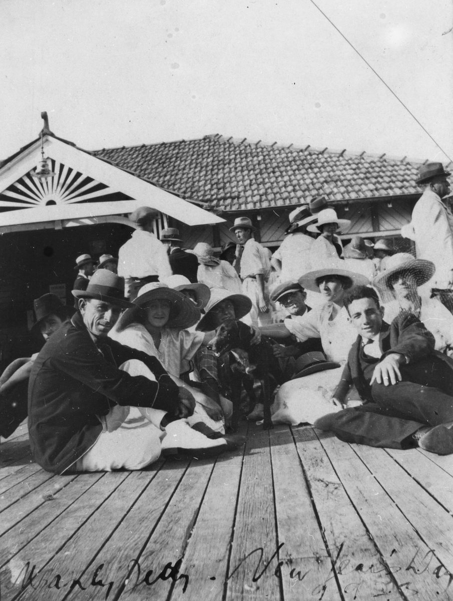 Relaxed group on the Manly Jetty, on New Year's Day, 1923