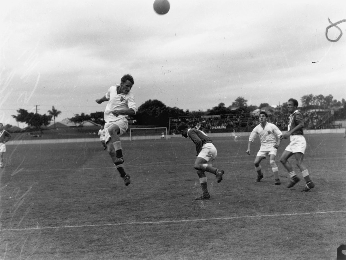 Queensland plays New South Wales in a soccer match at The 'Gabba, 1950