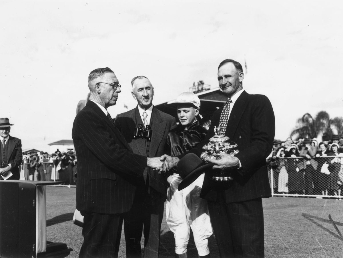 Doomben Cup being presented to owner-trainer Harry Lee, Doomben, 1950