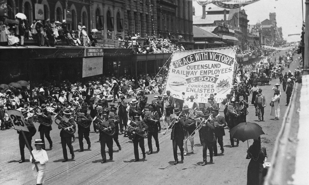 Marching band participates in the Peace Day procession in Brisbane, 1919