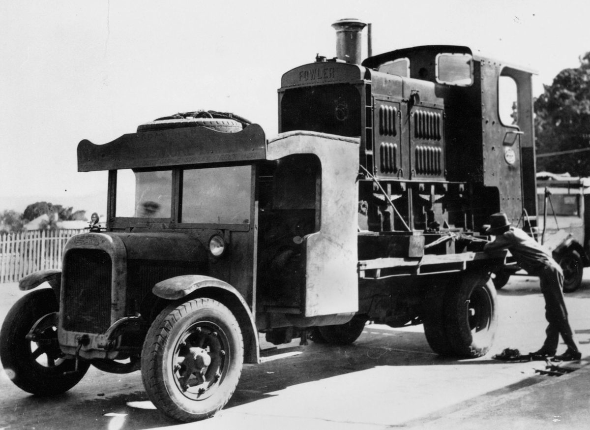 Single rear axle Federal truck transporting a cane train, 1925
