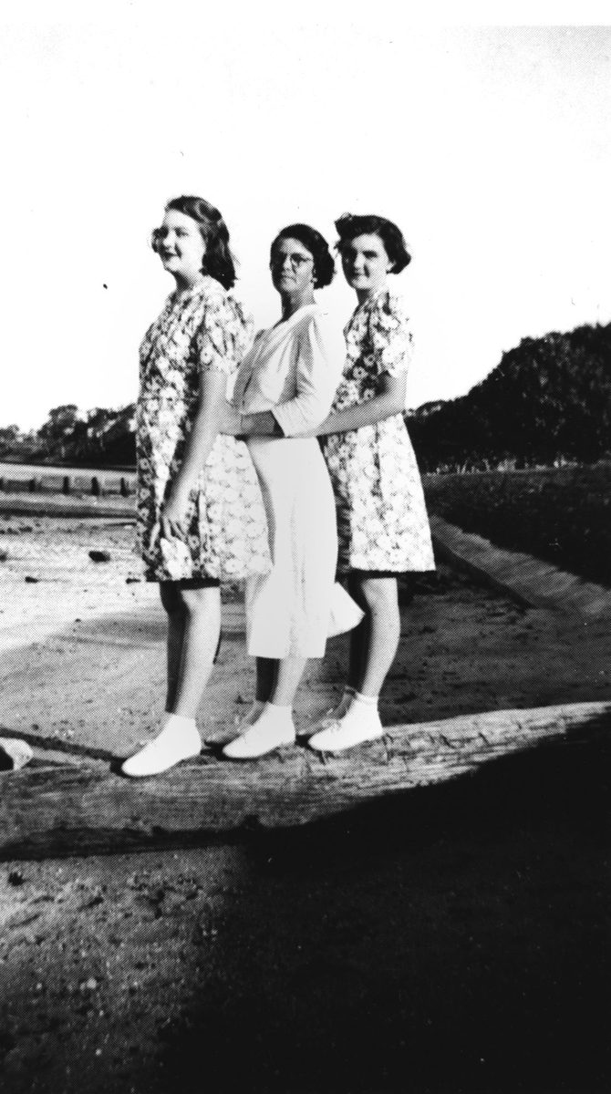 Three women gazing out to sea from the foreshore at Sandgate, Brisbane, 1942