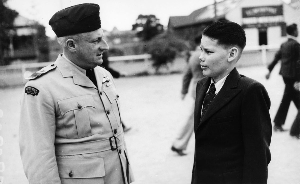 Young Air Cadet having a conversation with an Air Force Officer, South Brisbane, 1941