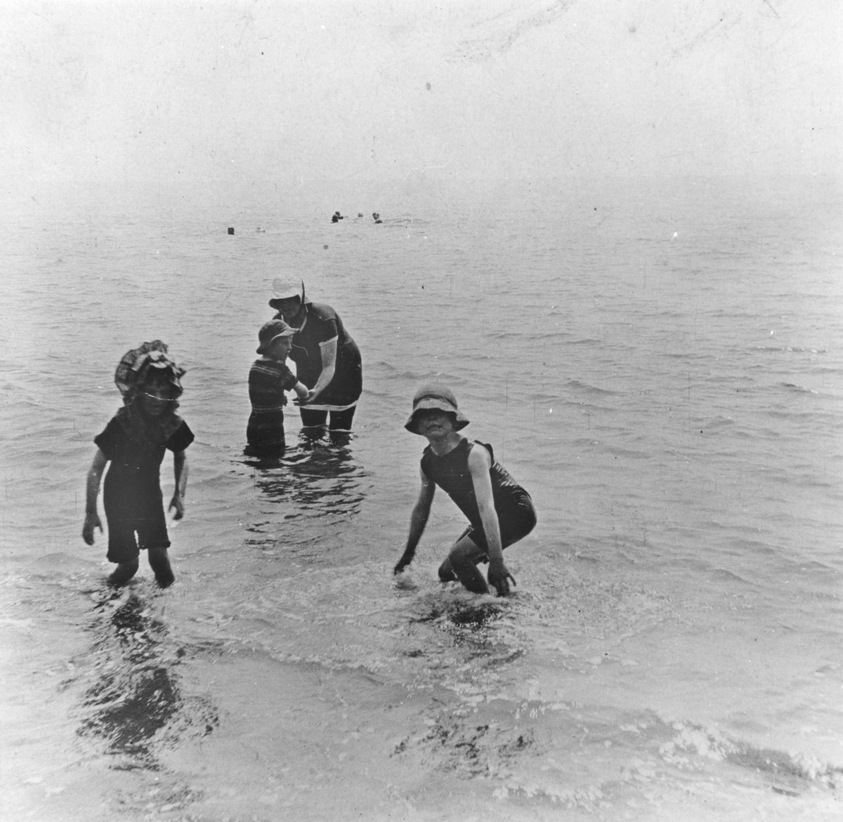 Young children enjoying a swim at Cribb Island, 1918