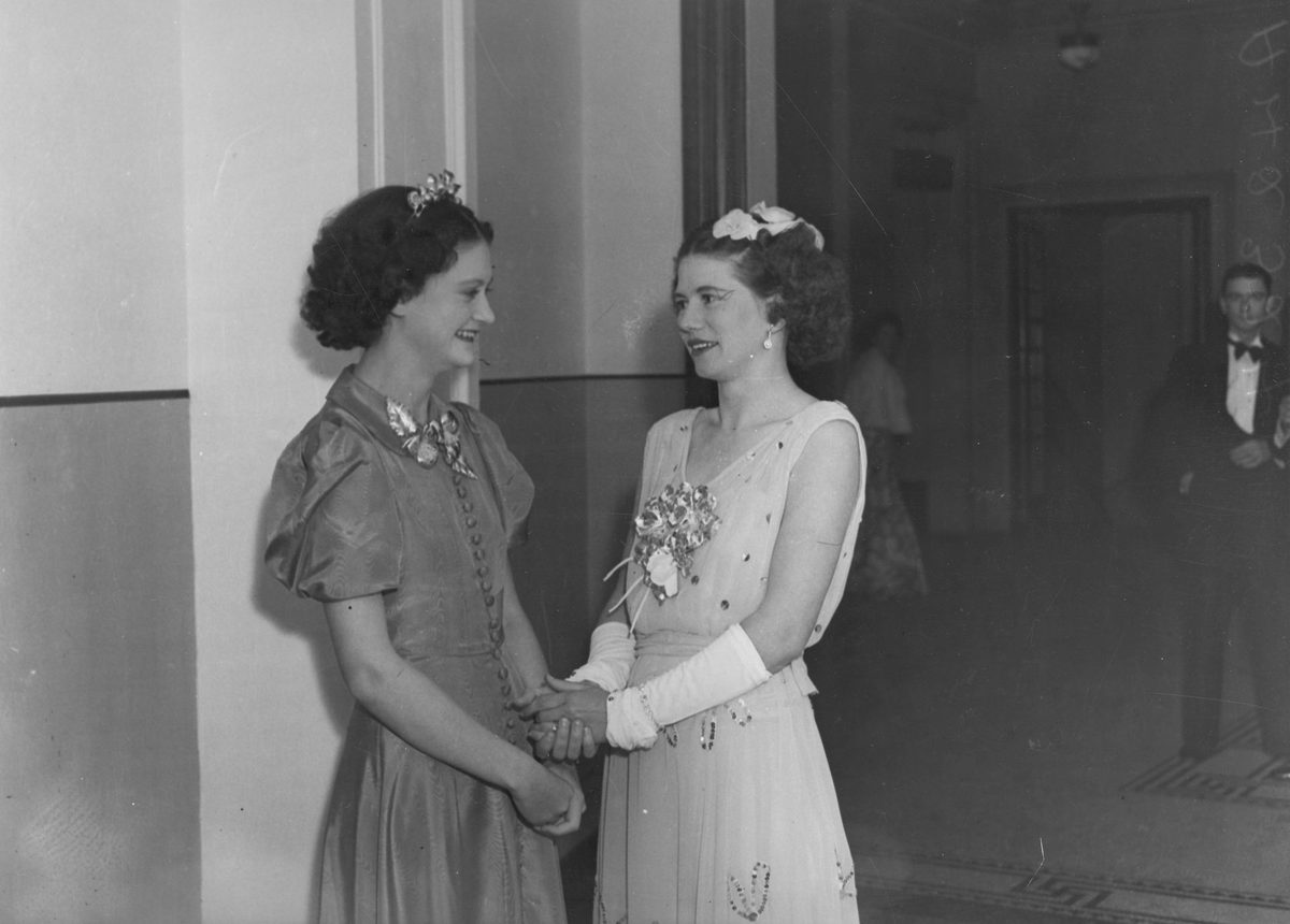 Two young women in evening dress, Brisbane, 1938