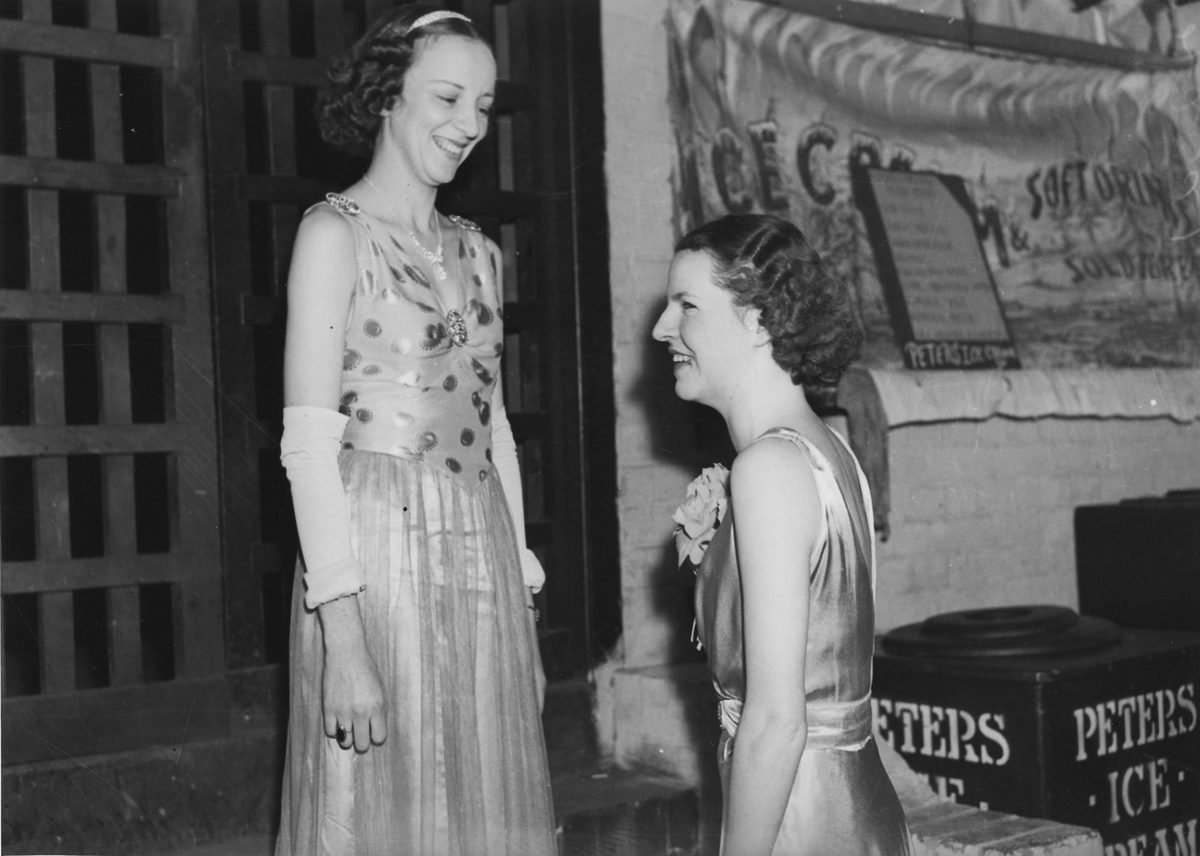 Two young women in evening dress, Brisbane, 1938