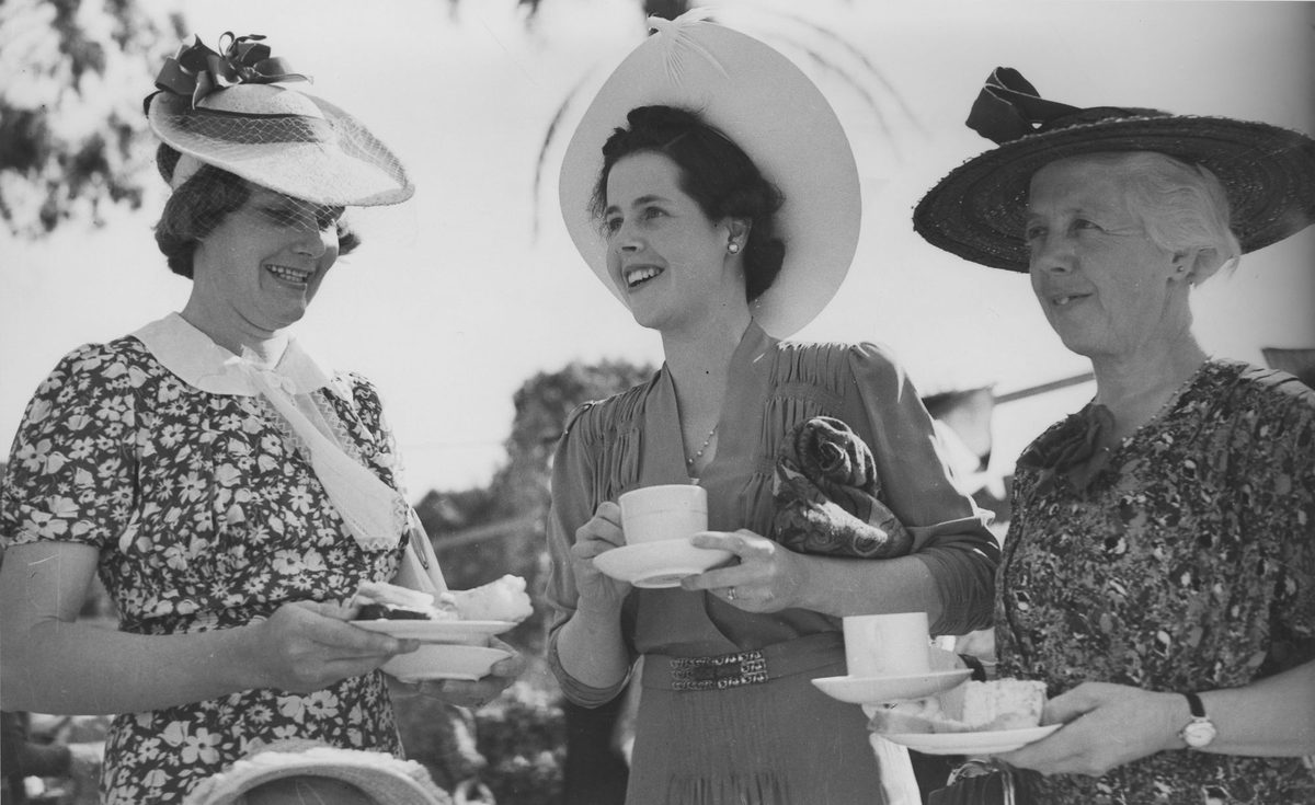 Three women at a social gathering, Brisbane, 1939