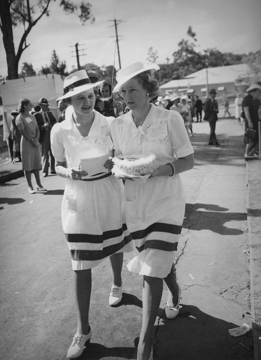 Two women in uniform at the Red Cross Fete Government House, 1940