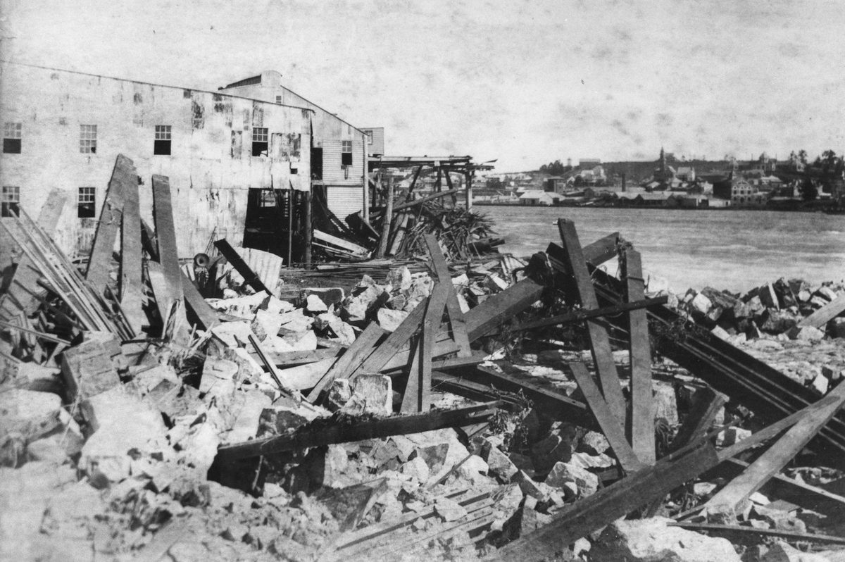 Debris around Pettigrew's Mill yard, William Street, Brisbane, in the wake of the 1893 flood