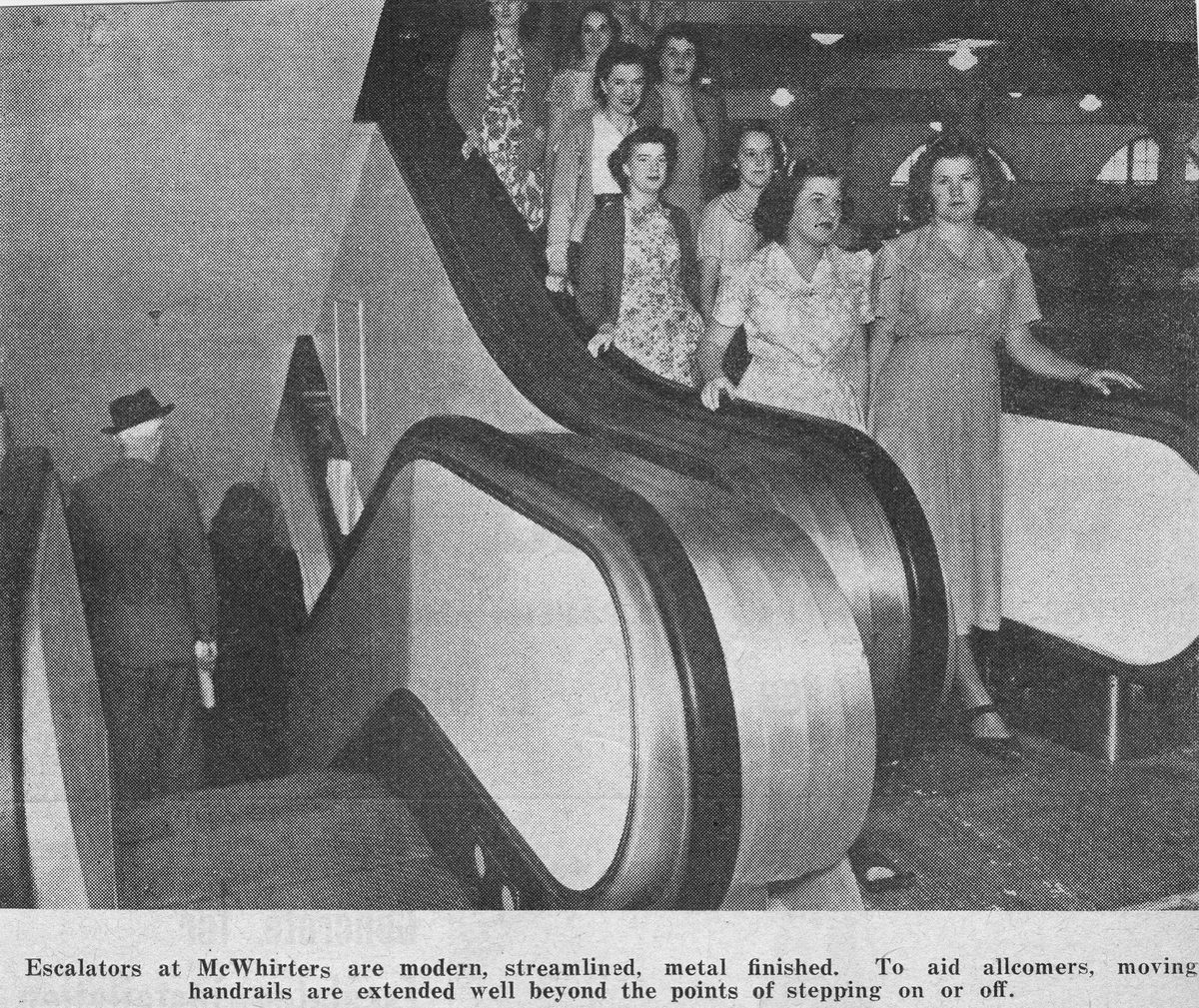 Customers using th escalators at McWhirters store, Brisbane, 1950