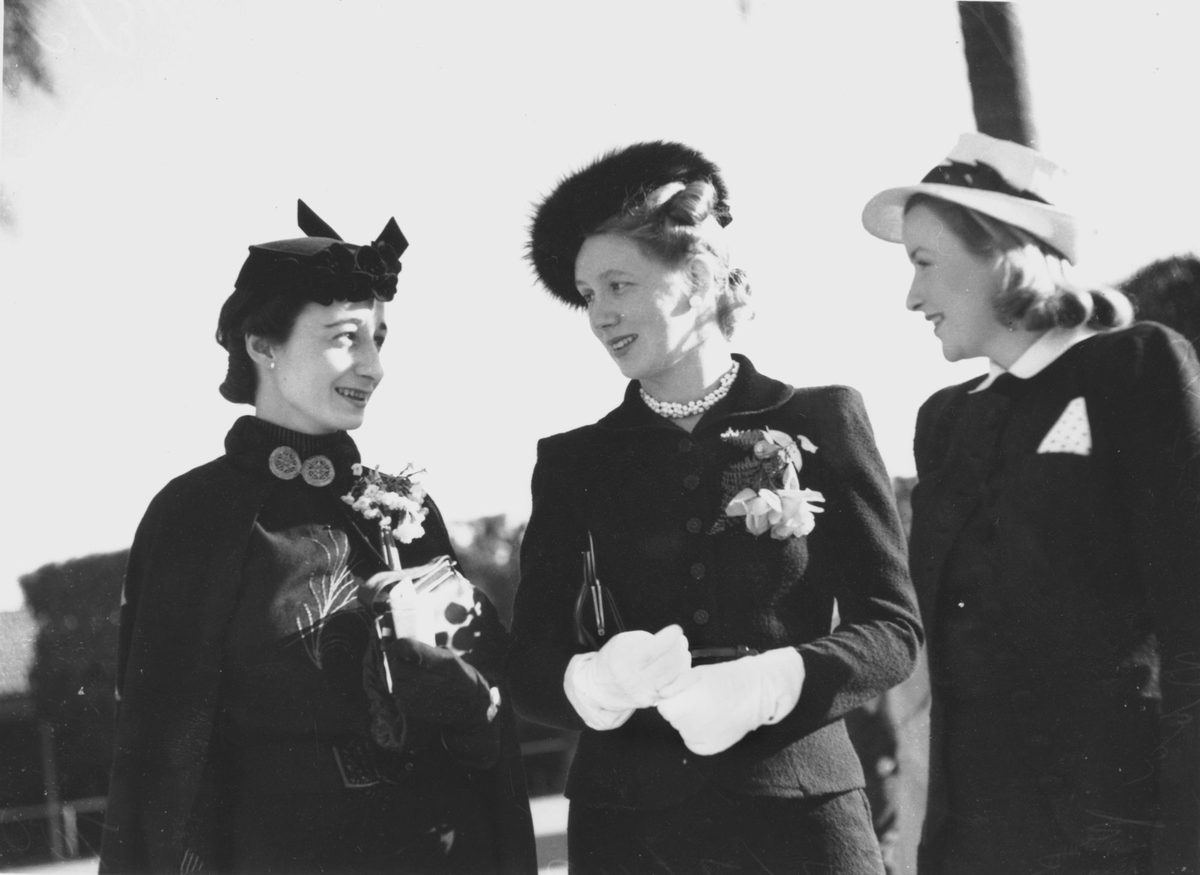 Three young women dressed for the Ascot Races, Brisbane, 1940