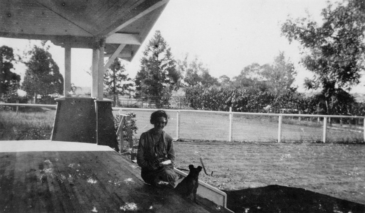 Vera Lahey on the porch of her Corinda home, Brisbane, 1919