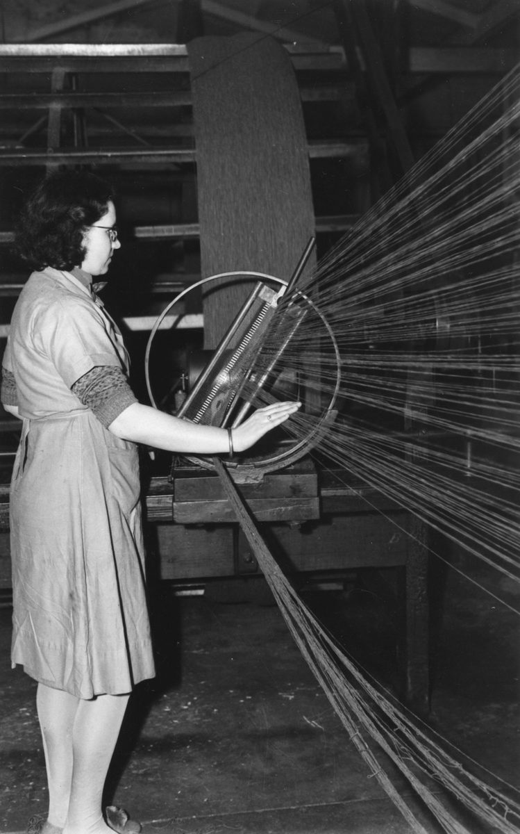 Operating the weaving machines for the production of military uniforms, Ipswich