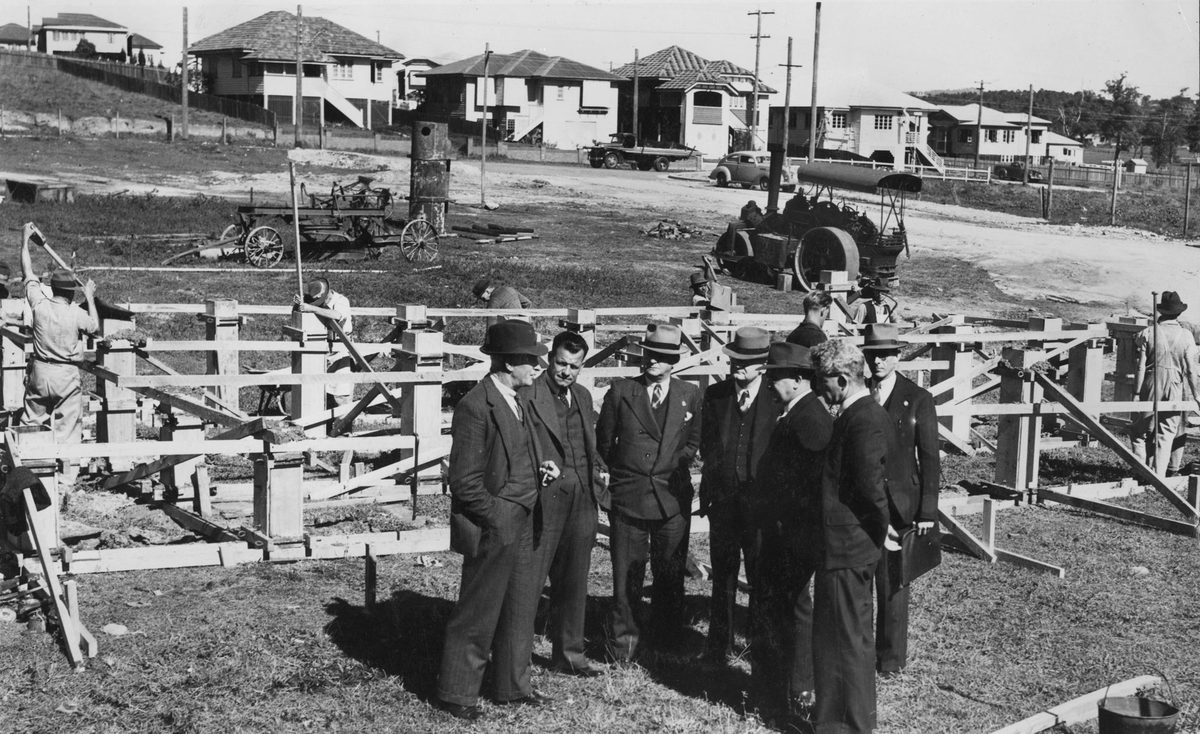 Discussion in a new housing estate, Brisbane, 1945
