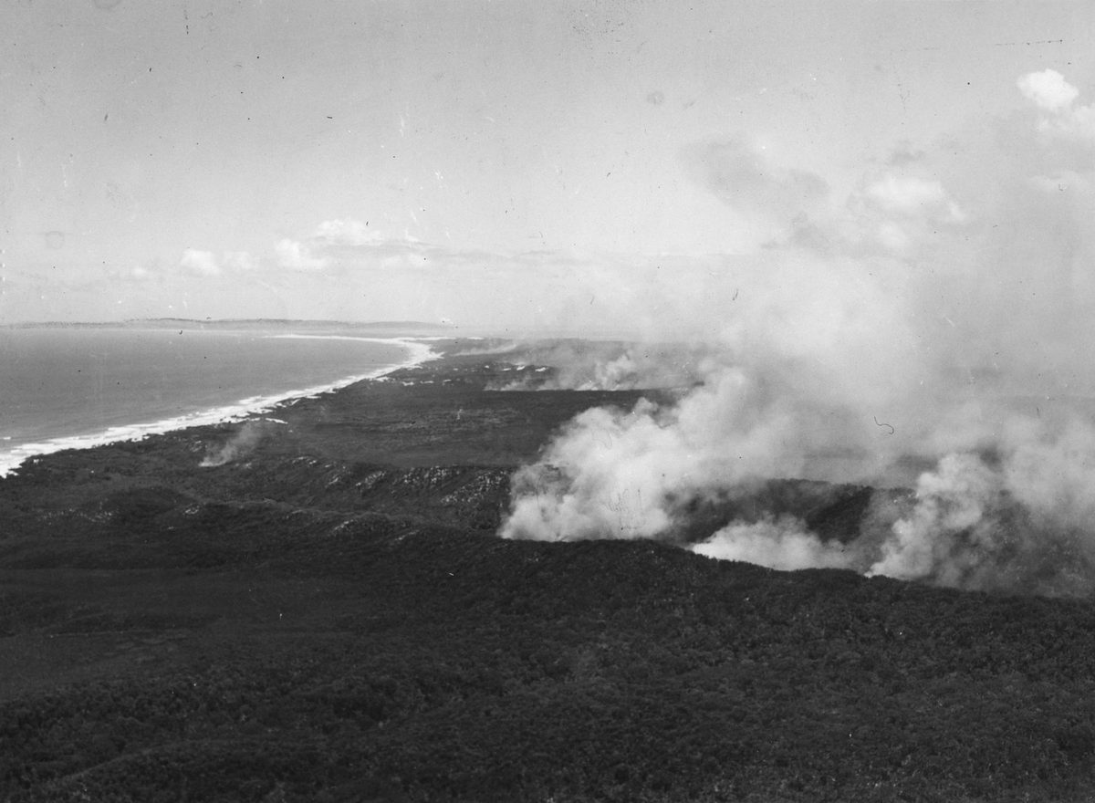 Aerial view of bushfires on Moreton Island, 1950