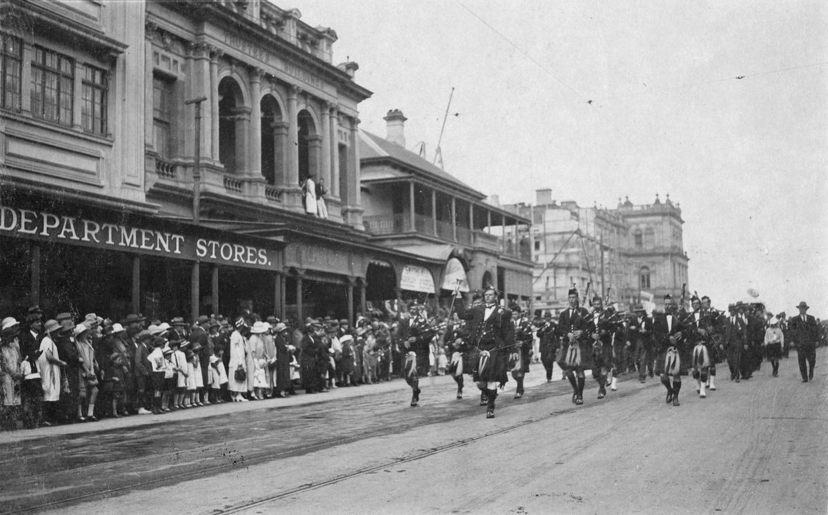 Bagpipe players lead the Eight Hour Day down Queen Street, Brisbane, 1924
