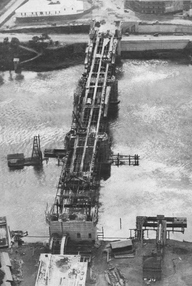 Aerial view of the William Jolly Bridge during construction, Brisbane, 1931