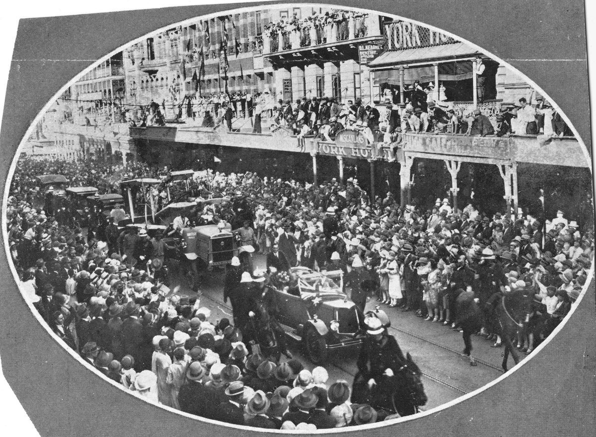 Procession for Bert Hinkler progresses along Queen Street, Brisbane, 1928
