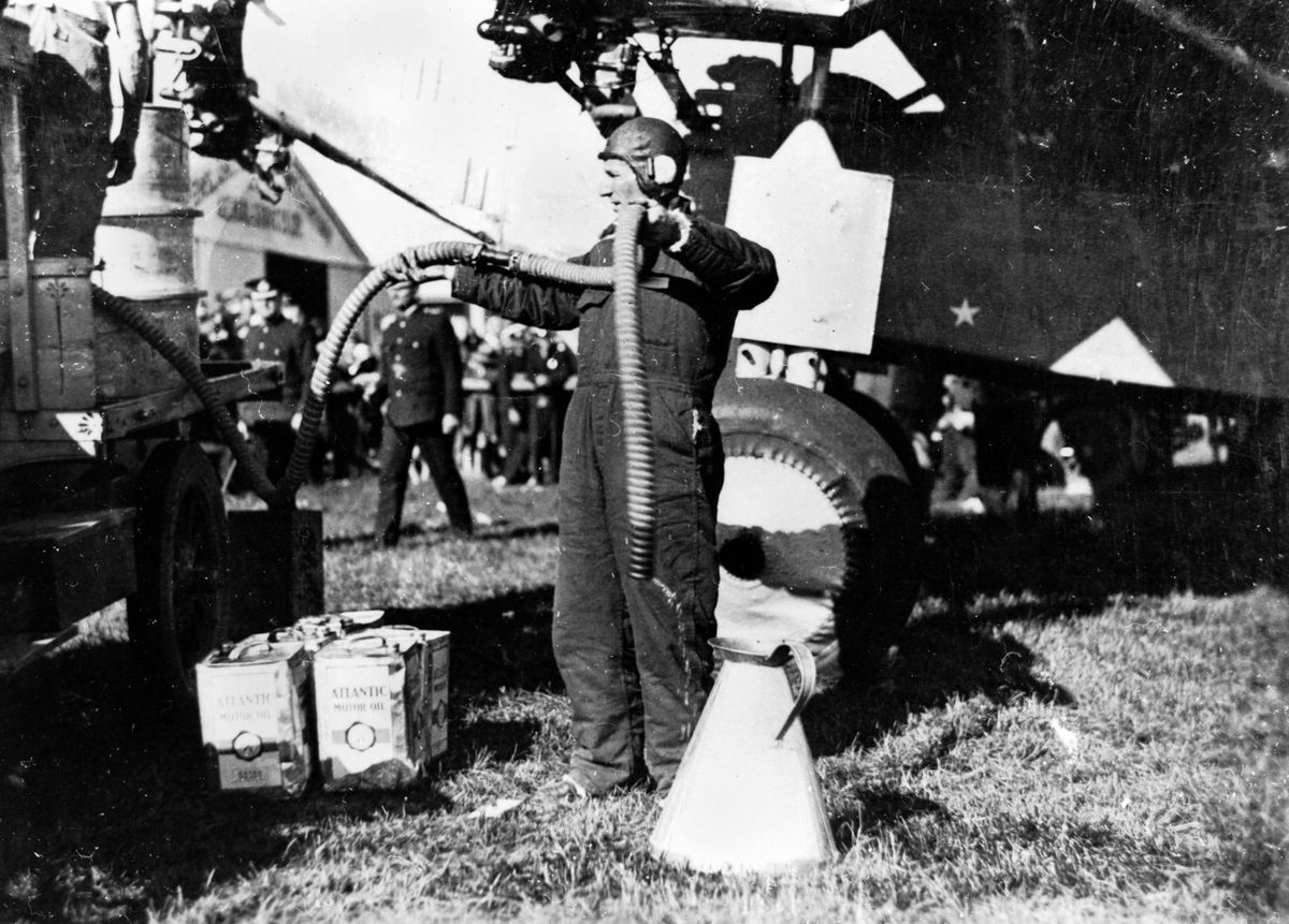 Charles Kingsford Smith refuelling his plane in Brisbane, June 1928